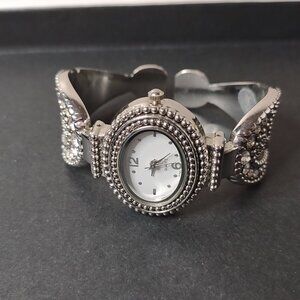 6 Inch Pretty Silver Tone Cuff Watch With White Dial